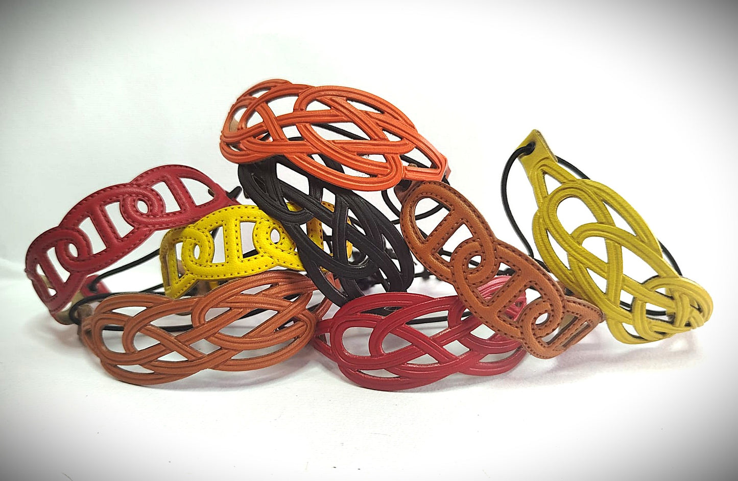 BRACCIALE IN VERA PELLE INTRECCIO STAMPATO IN HF CON CORDINO ELASTICO REGOLABILE