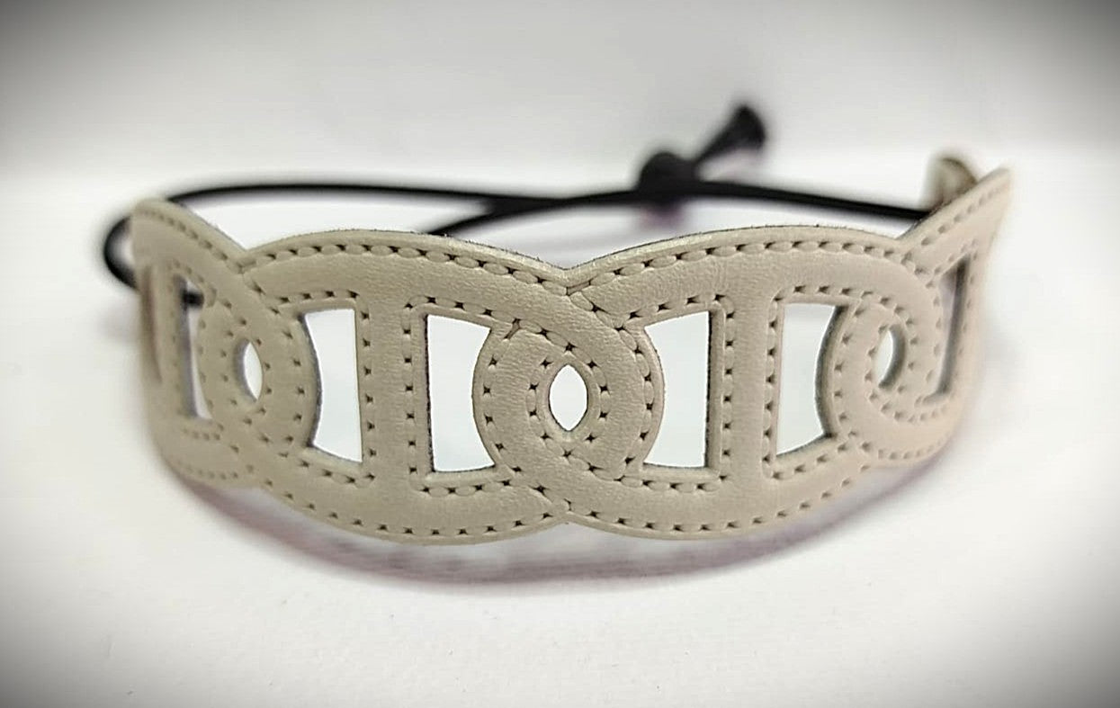 BRACCIALE IN VERA PELLE INTRECCIO STAMPATO IN HF CON CORDINO ELASTICO REGOLABILE